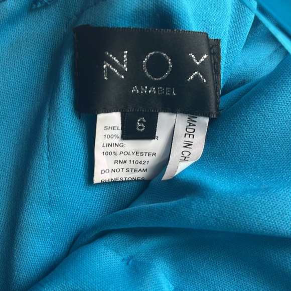 Shiny Blue Strapless Homecoming Dress - Picture 4 of 4